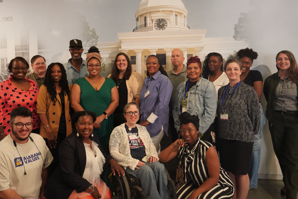 Several people pose for a photo opportunity.